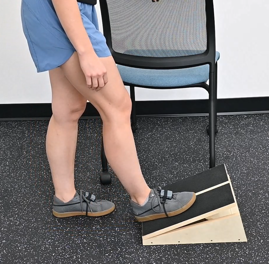 Slant board left leg pose